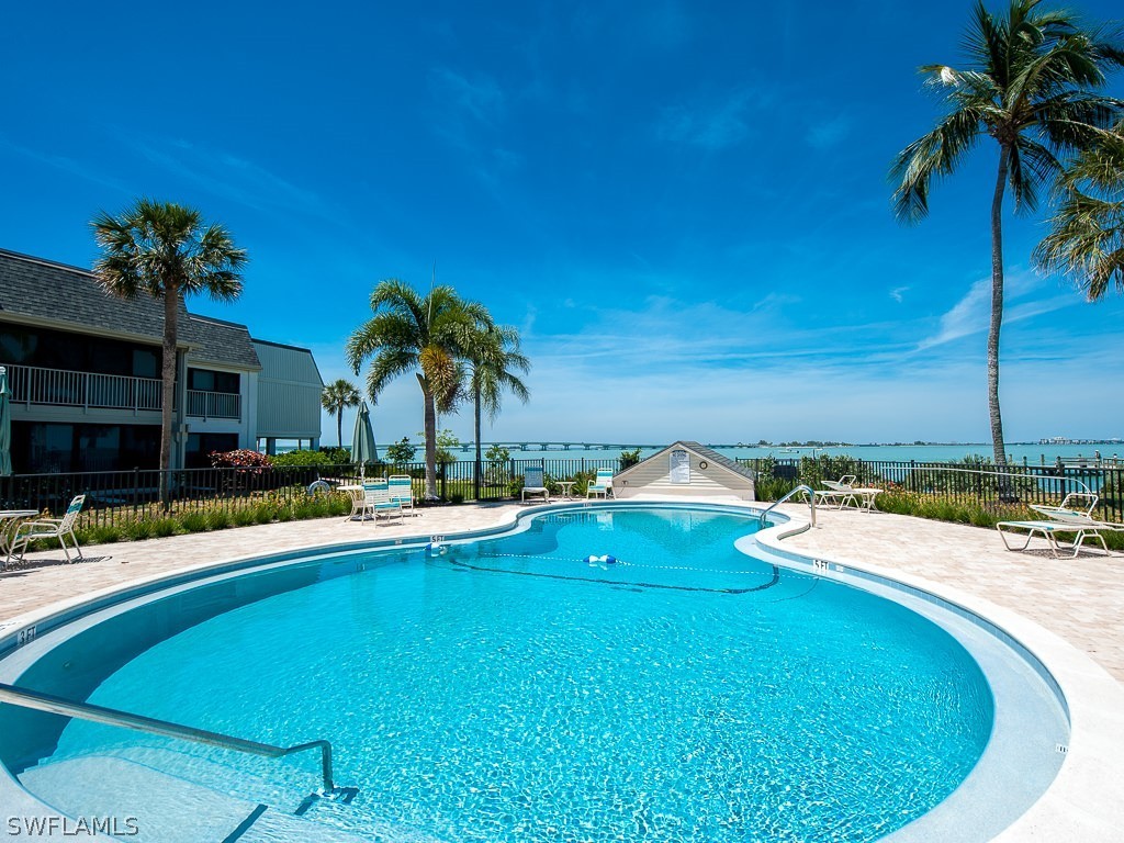 760 Sextant Drive, Unit 732 Sanibel, FL 33957 - Photo 29 of 35 a view of a house with swimming pool