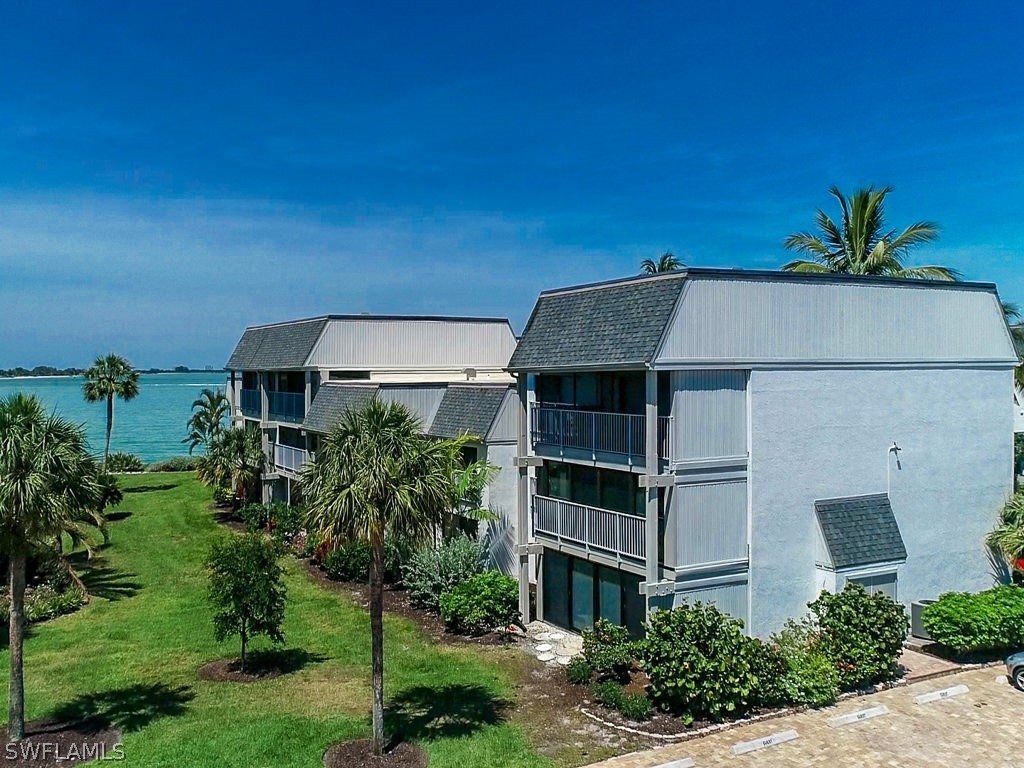 760 Sextant Drive, Unit 732 Sanibel, FL 33957 - Photo 5 of 35 a house view with a garden space