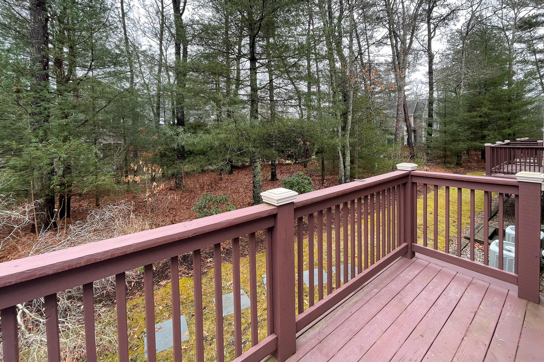 23 Gold Leaf Lane Mashpee, MA 02649 - Photo 28 of 33 a view of a wooden deck with trees