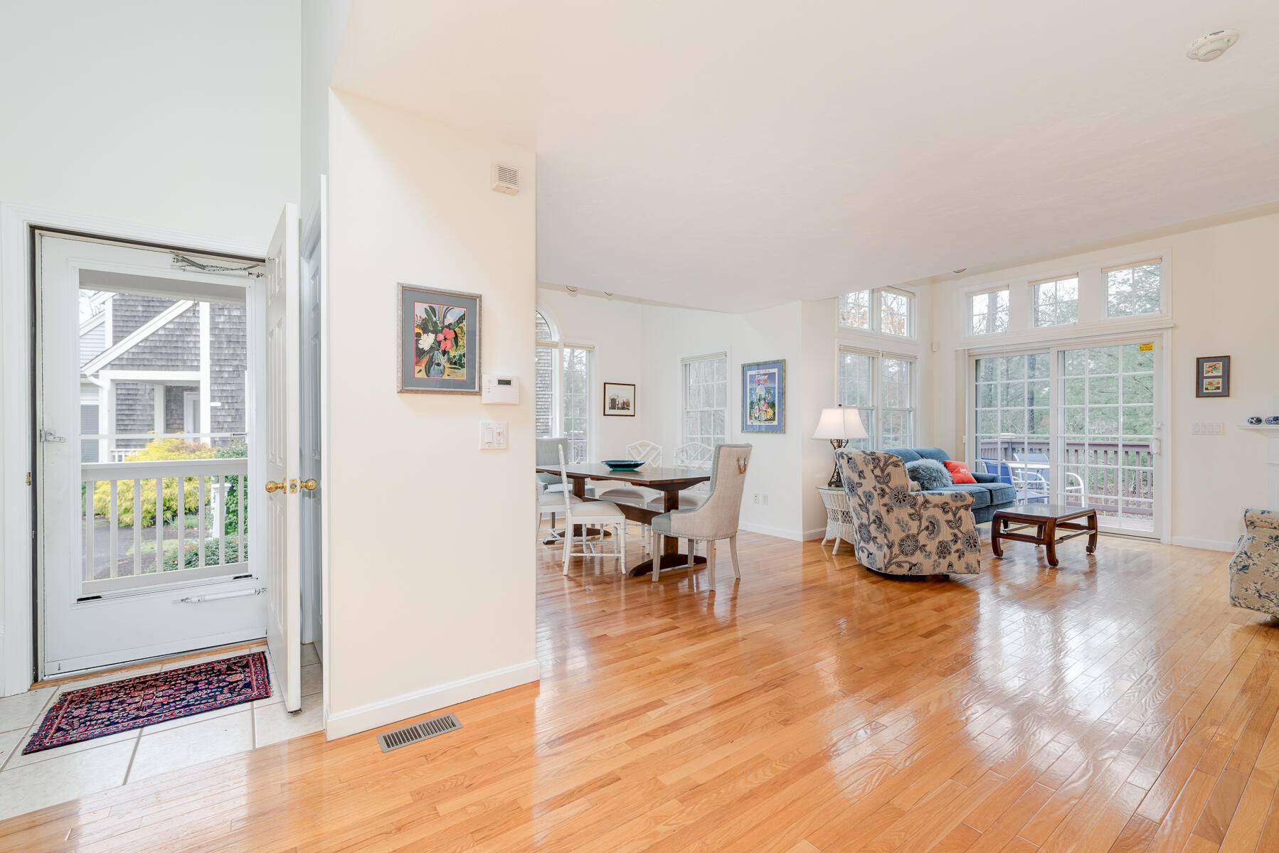 23 Gold Leaf Lane Mashpee, MA 02649 - Photo 4 of 33 a living room with furniture and large windows