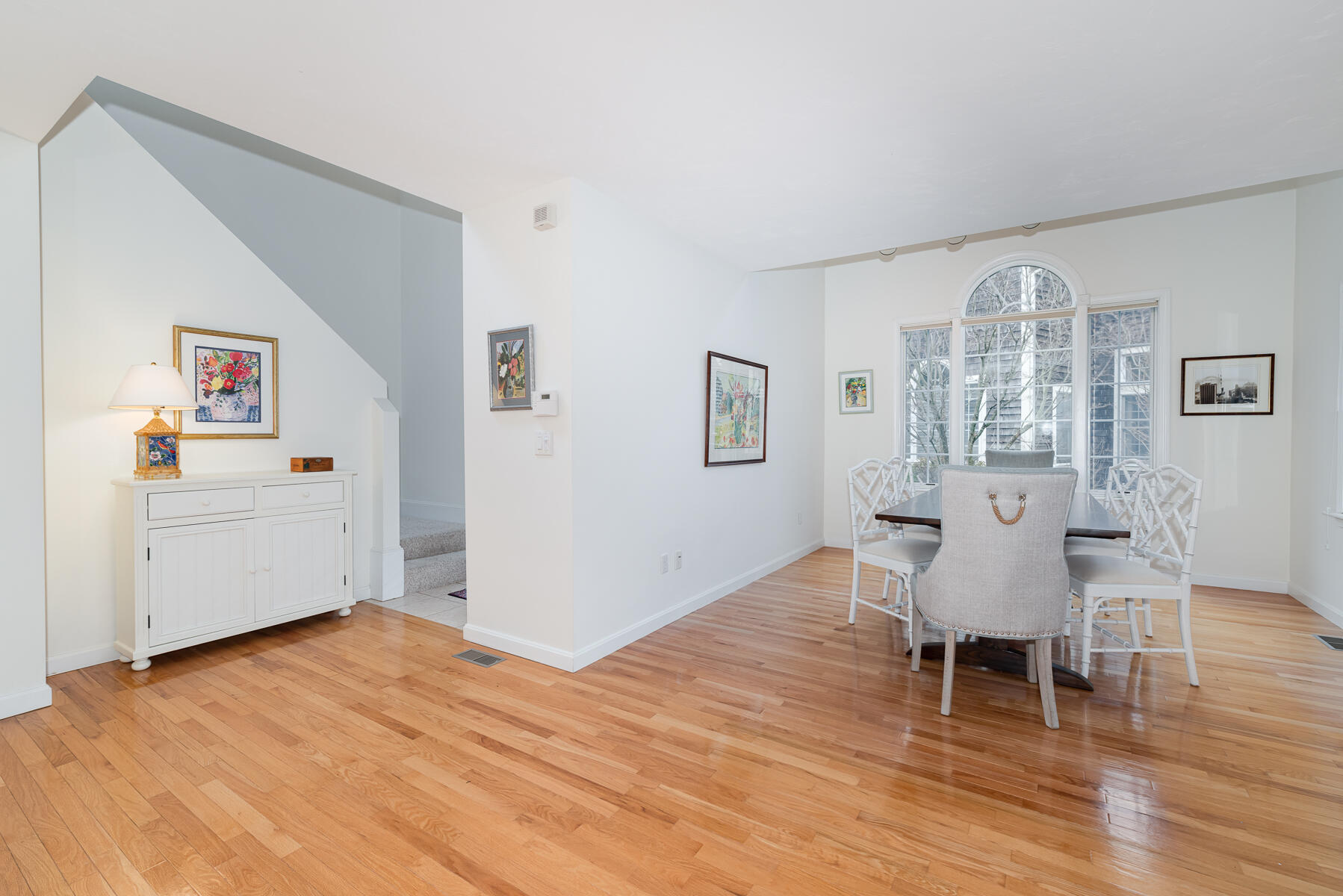 23 Gold Leaf Lane Mashpee, MA 02649 - Photo 5 of 33 a view of a livingroom with furniture a chandelier and wooden floor