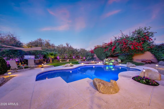 a view of a city with a lake