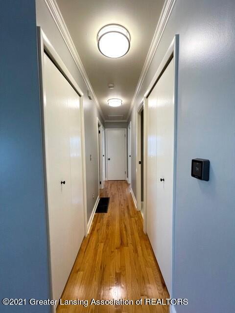 2121 Riverside Court Lansing, MI 48906 - Photo 15 of 34 Hallway to Bedrooms