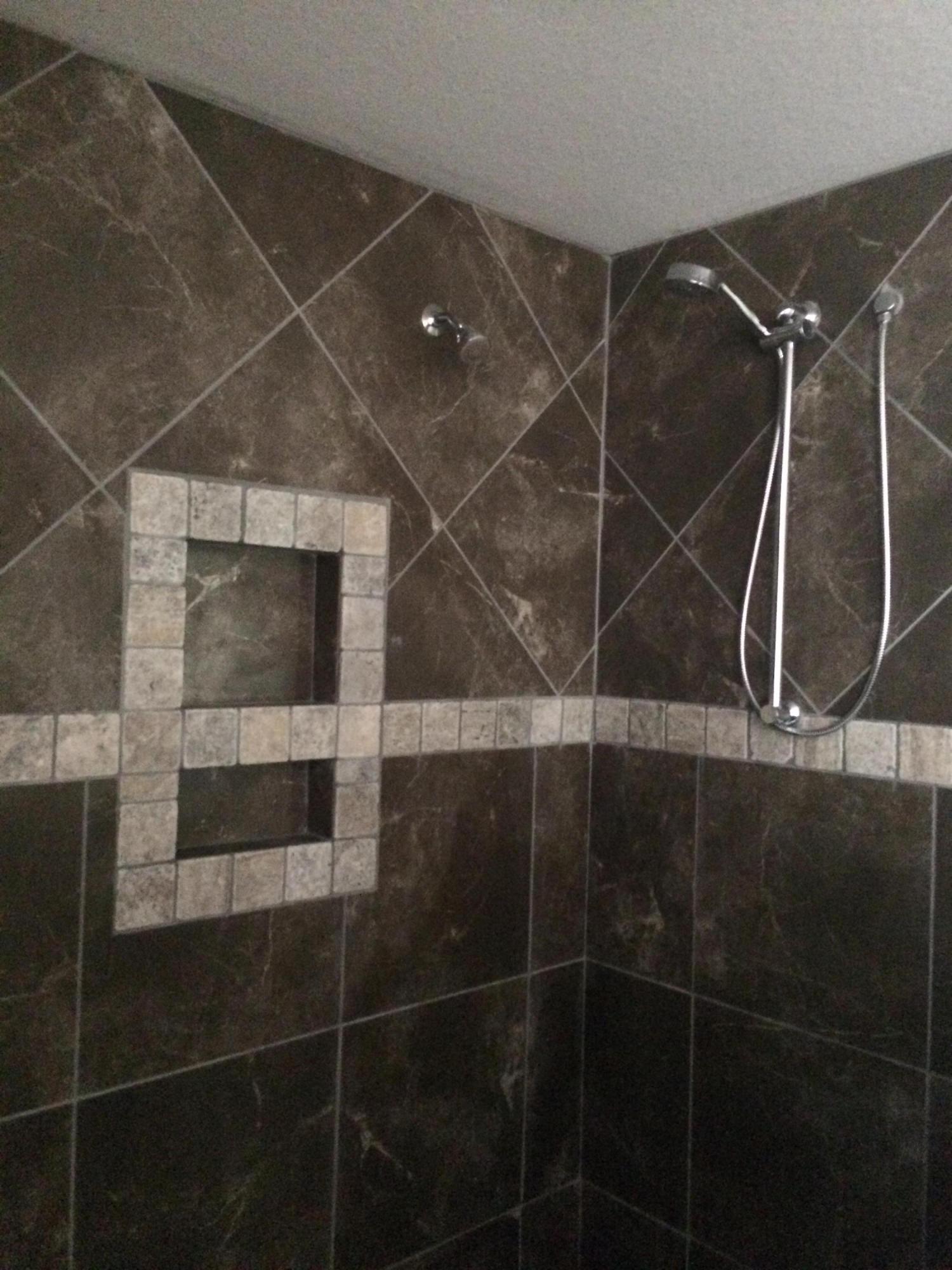 2399 Cove Road Navarre, FL 32566 - Photo 3 of 7 a bathroom with a shower