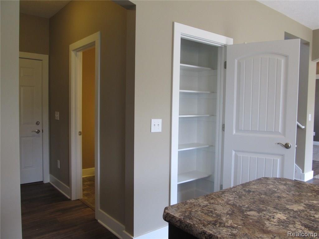 71198 Coon Creek Road Armada, MI 48005 - Photo 8 of 19 Garage Entry/Half Bath Entry/Kitchen Pantry