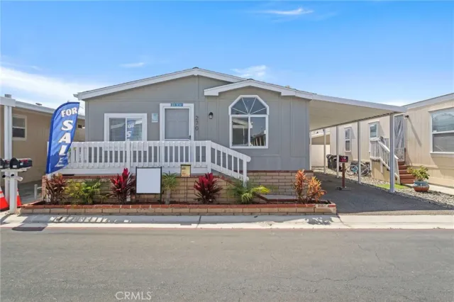 a front view of a house with a garage