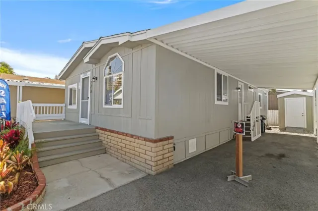 a picture of a house with a swimming pool