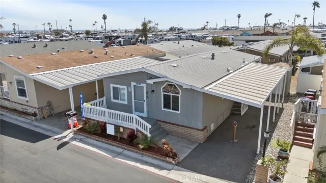 an aerial view of a house with stairs