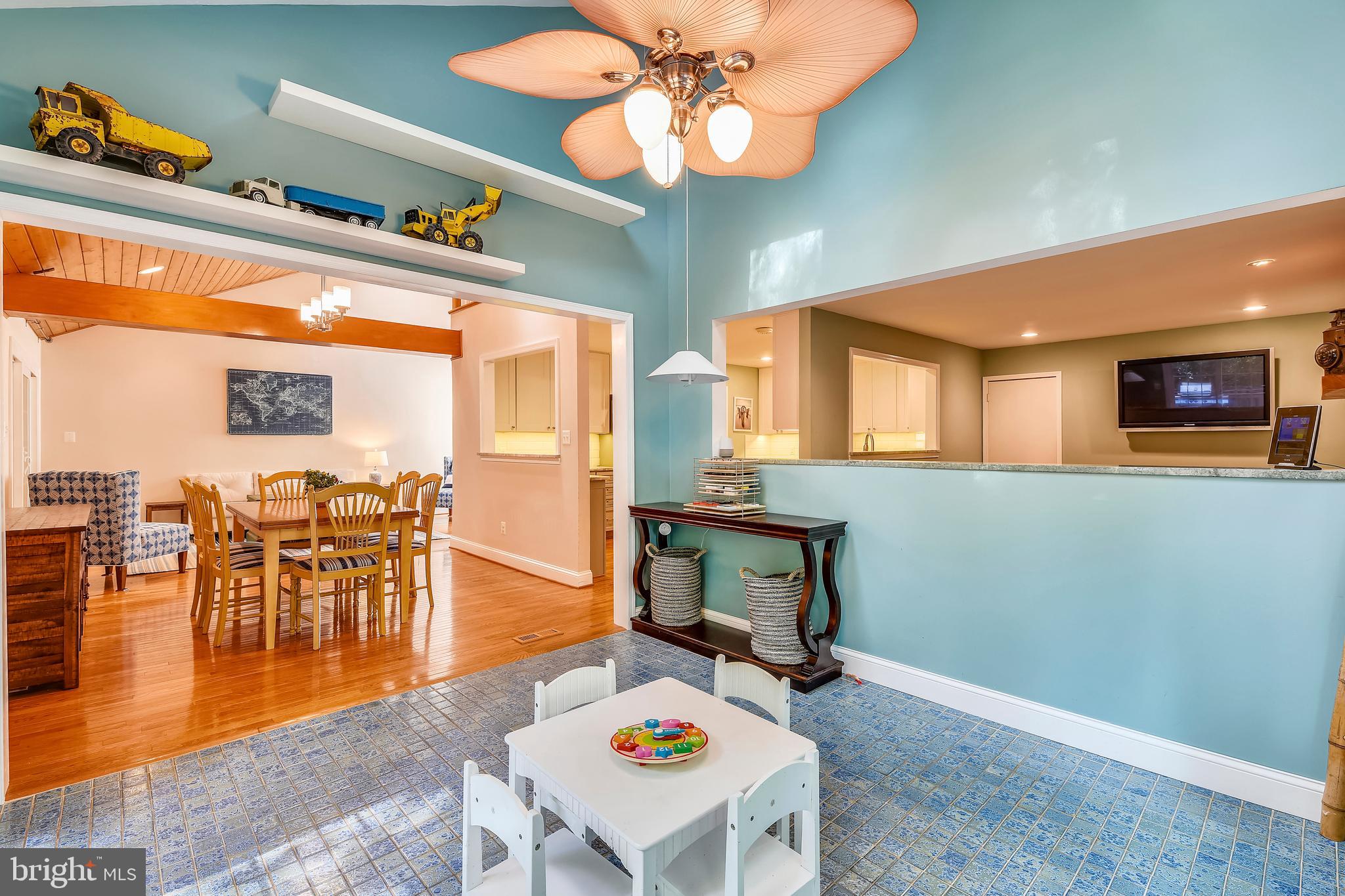 9317 Raintree Road Burke, VA 22015 - Photo 11 of 69 Sunroom open to family room and dining room