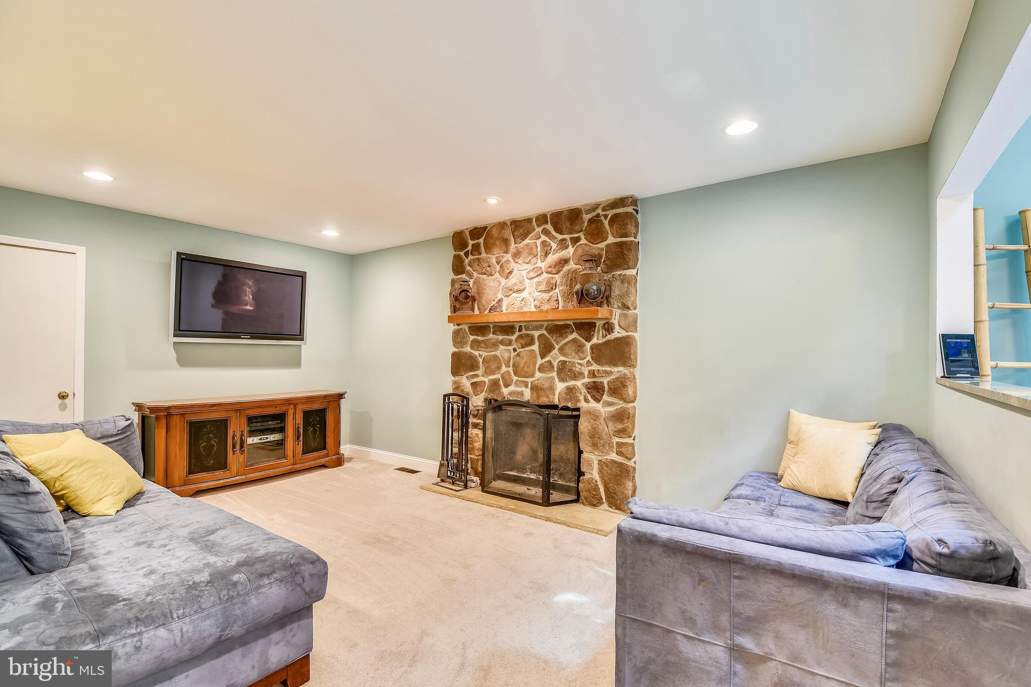 9317 Raintree Road Burke, VA 22015 - Photo 14 of 69 Main level family room with wood burning fireplace