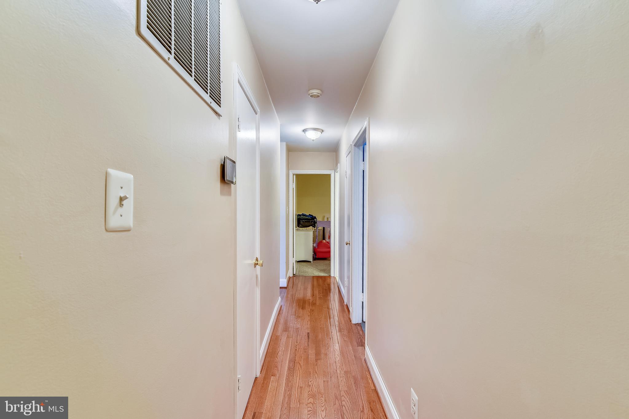 9317 Raintree Road Burke, VA 22015 - Photo 19 of 69 Main level corridor