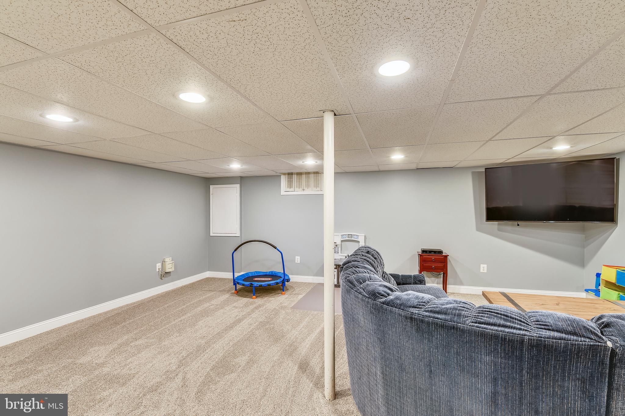 9317 Raintree Road Burke, VA 22015 - Photo 40 of 69 Lower level huge rec room
