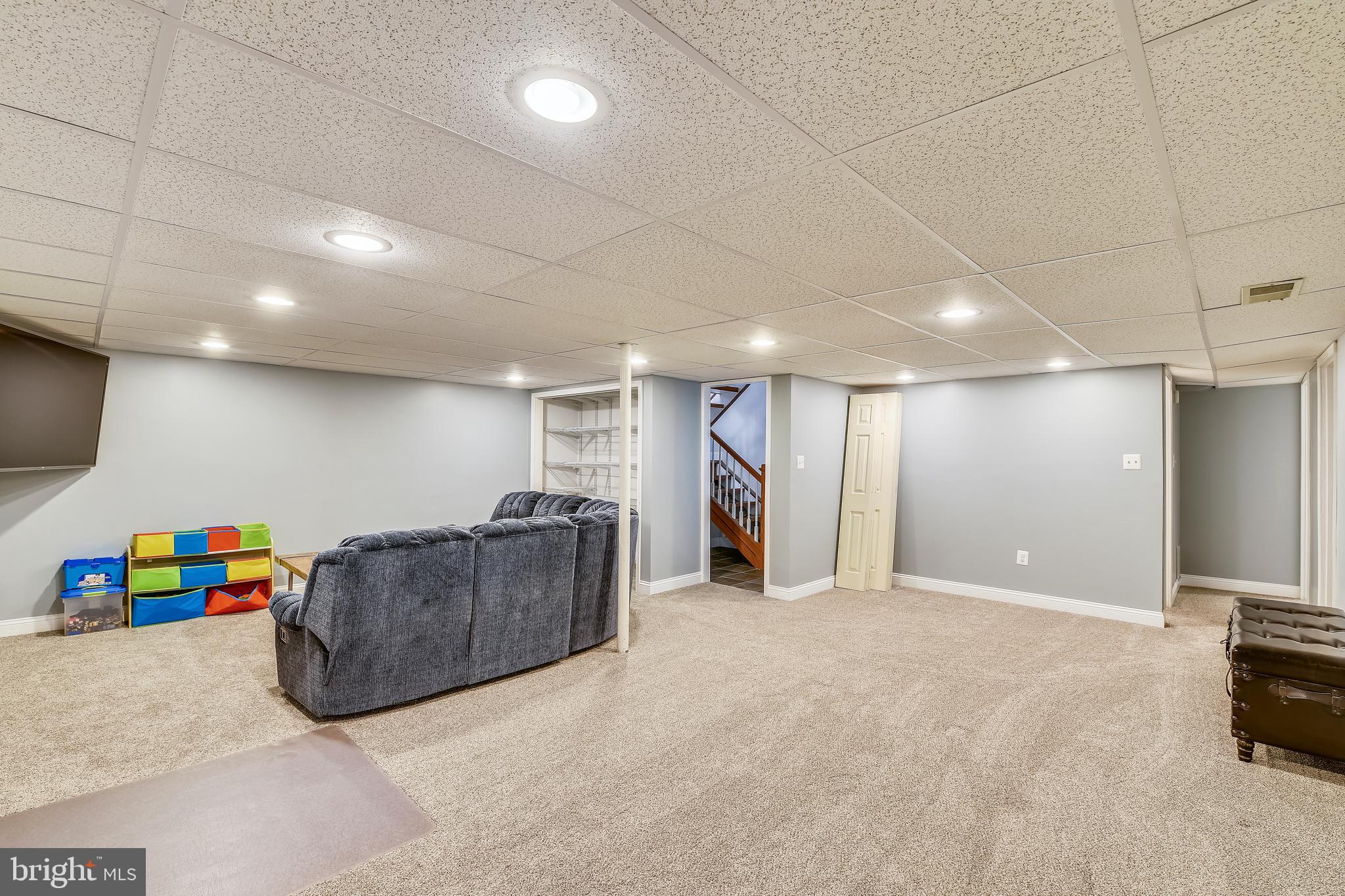 9317 Raintree Road Burke, VA 22015 - Photo 41 of 69 Lower level rec room