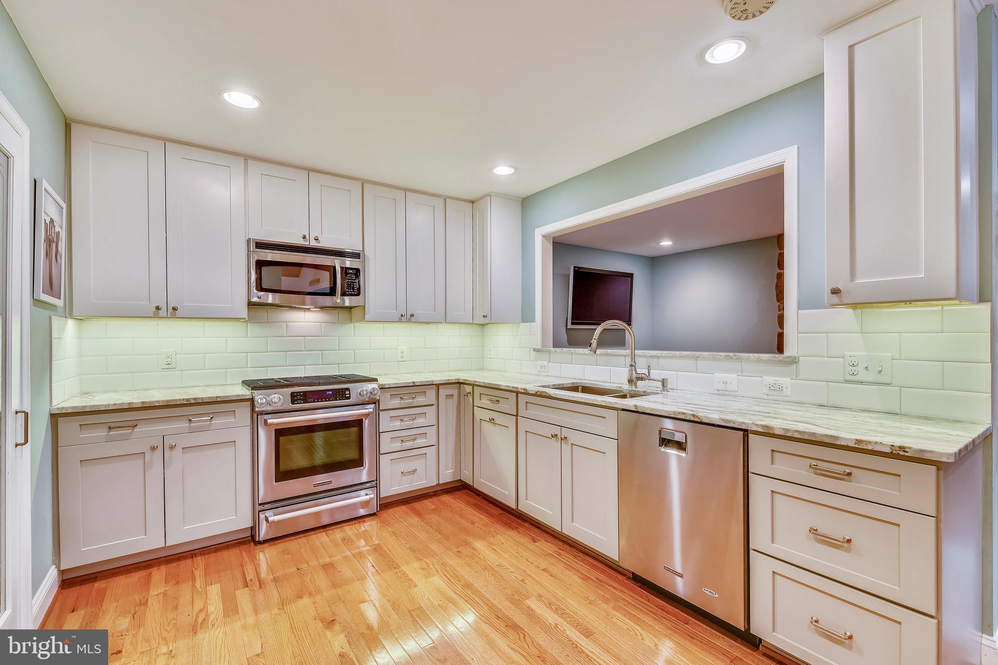 9317 Raintree Road Burke, VA 22015 - Photo 8 of 69 Fully renovated kitchen with stunning granite