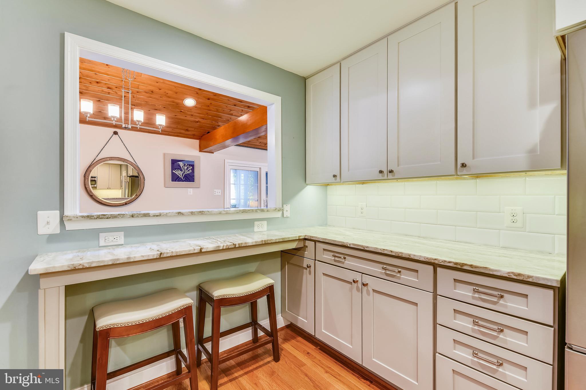 9317 Raintree Road Burke, VA 22015 - Photo 9 of 69 Renovated kitchen with breakfast bar