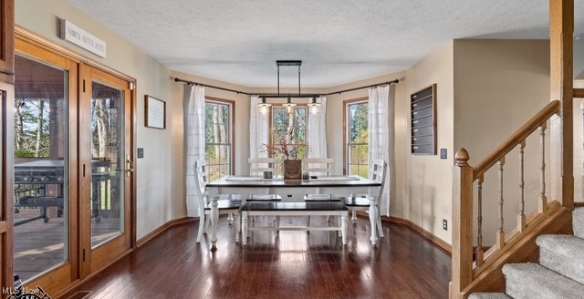 8995 Ridge Road Wooster, OH 44691 - Photo 23 of 50 Dining area featuring hardwood / wood-style flooring, stairway, and a textured ceiling