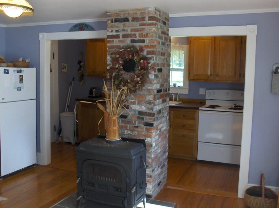 133 Marshville Road Harrington, ME 04643 - Photo 4 of 31 Kitchen with exposed brick and wood...
