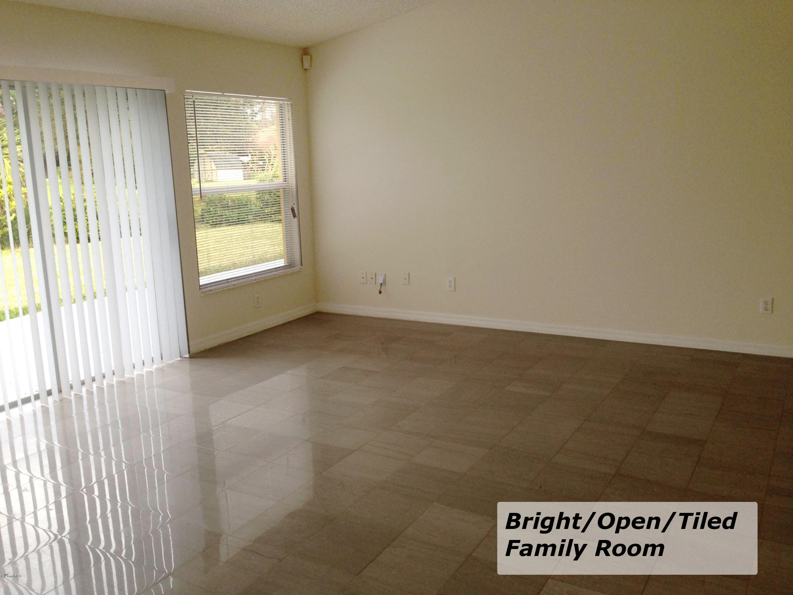 839 Raleigh Road Southeast Palm Bay, FL 32909 - Photo 4 of 13 Family Room