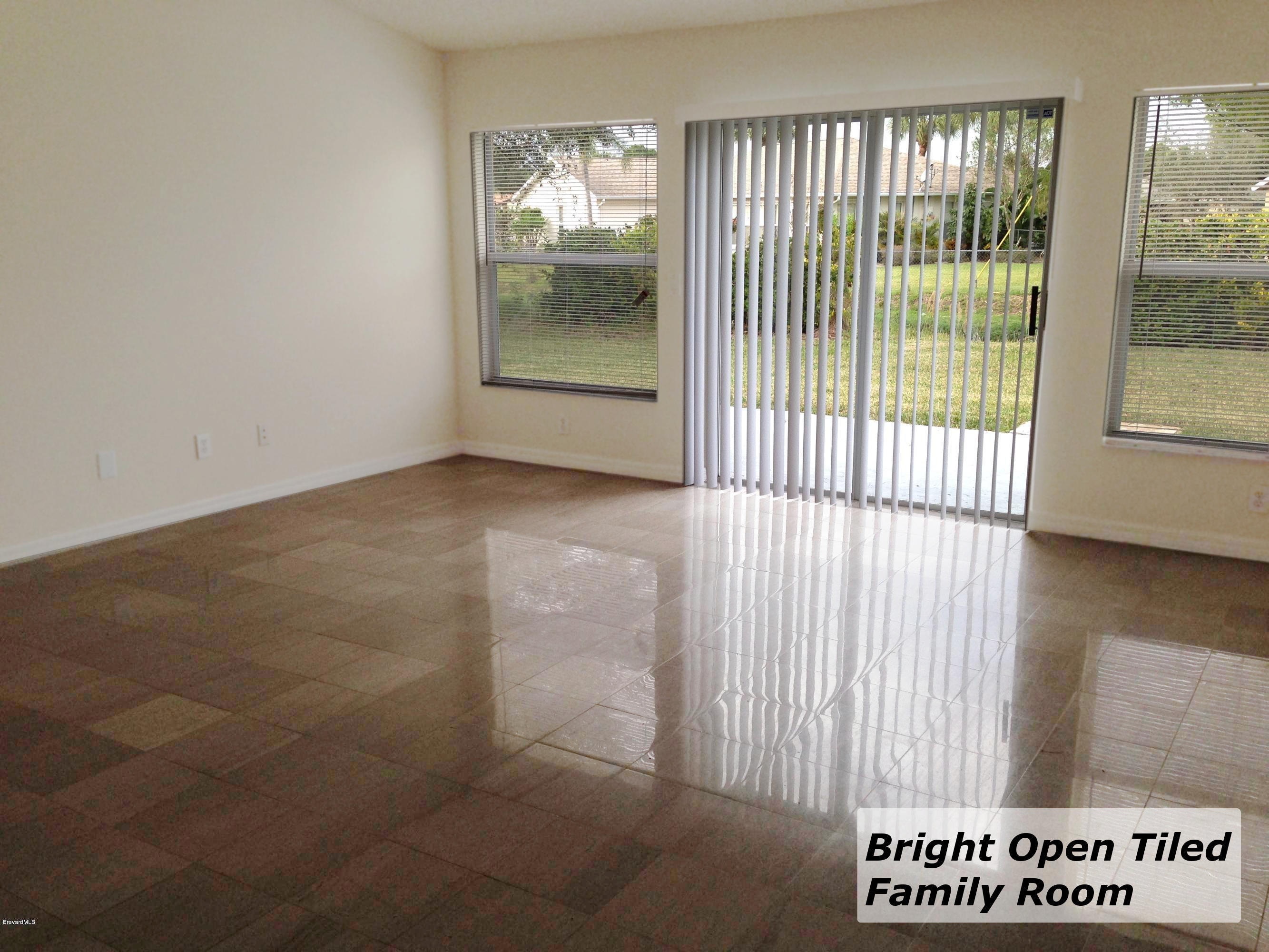 839 Raleigh Road Southeast Palm Bay, FL 32909 - Photo 5 of 13 Family Room 2