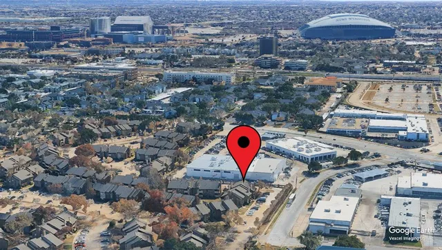 an aerial view of residential house with parking space