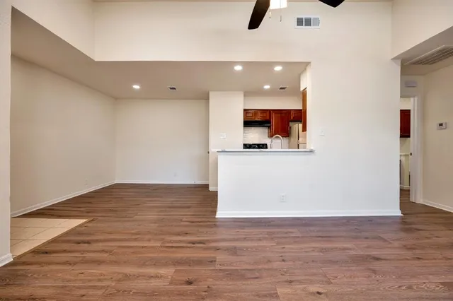 a view of a kitchen with a sink and a dishwasher