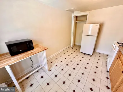 a living room with a couch and a flat screen tv