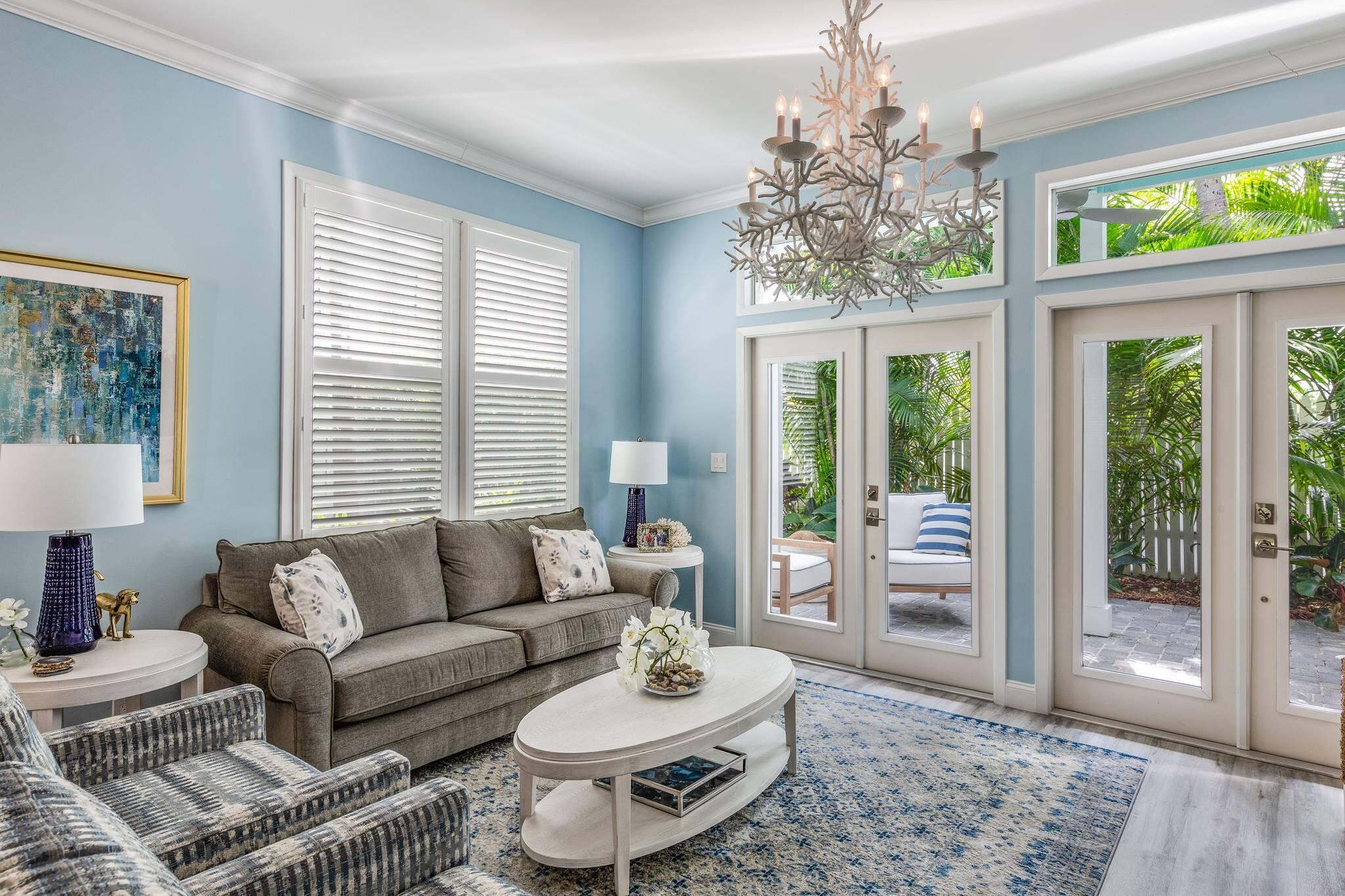 216 Fleming Street Key West, FL 33040 - Photo 16 of 33 a living room with furniture and a large window