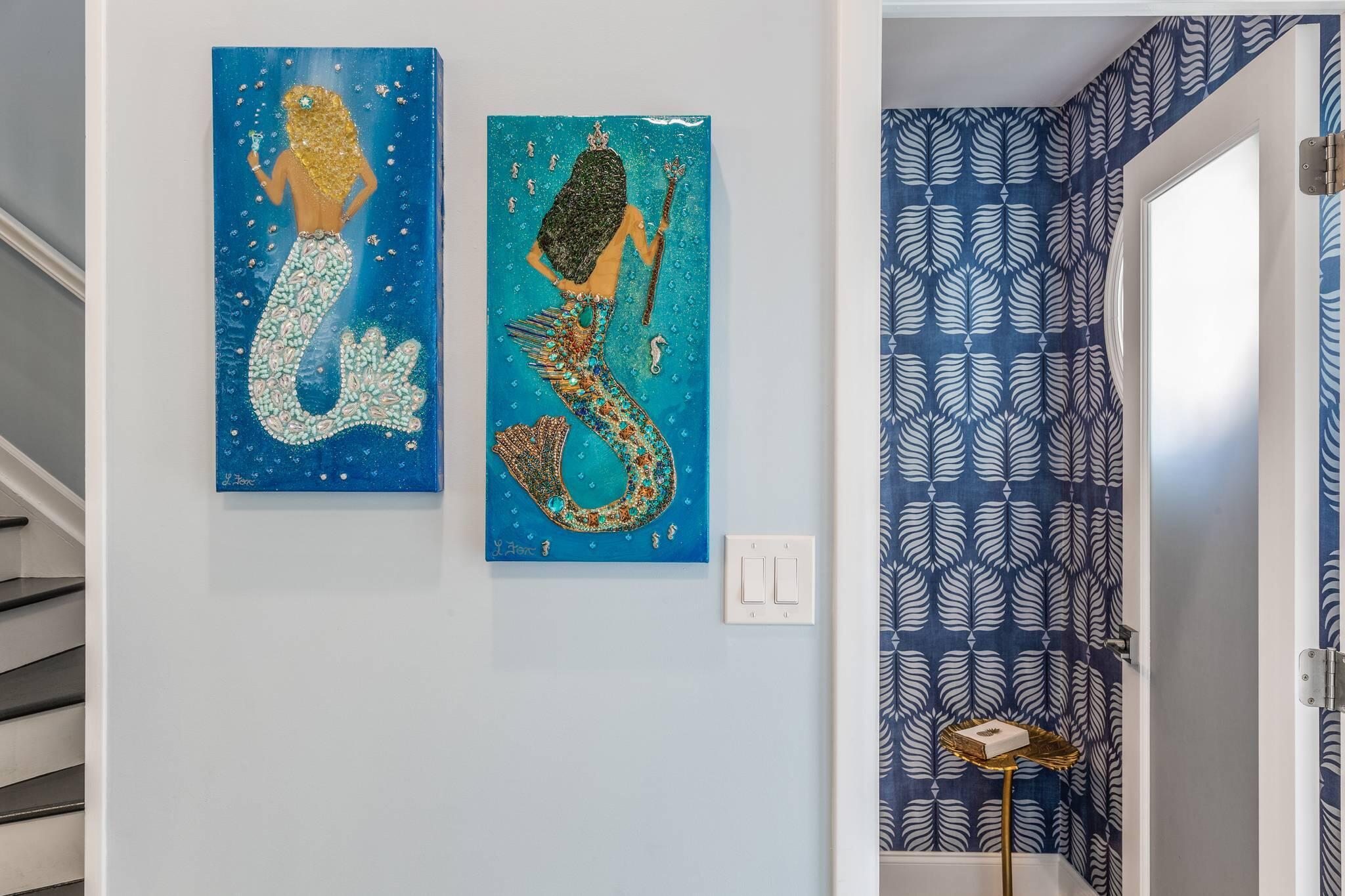 216 Fleming Street Key West, FL 33040 - Photo 20 of 33 a painting on a wall next to a window