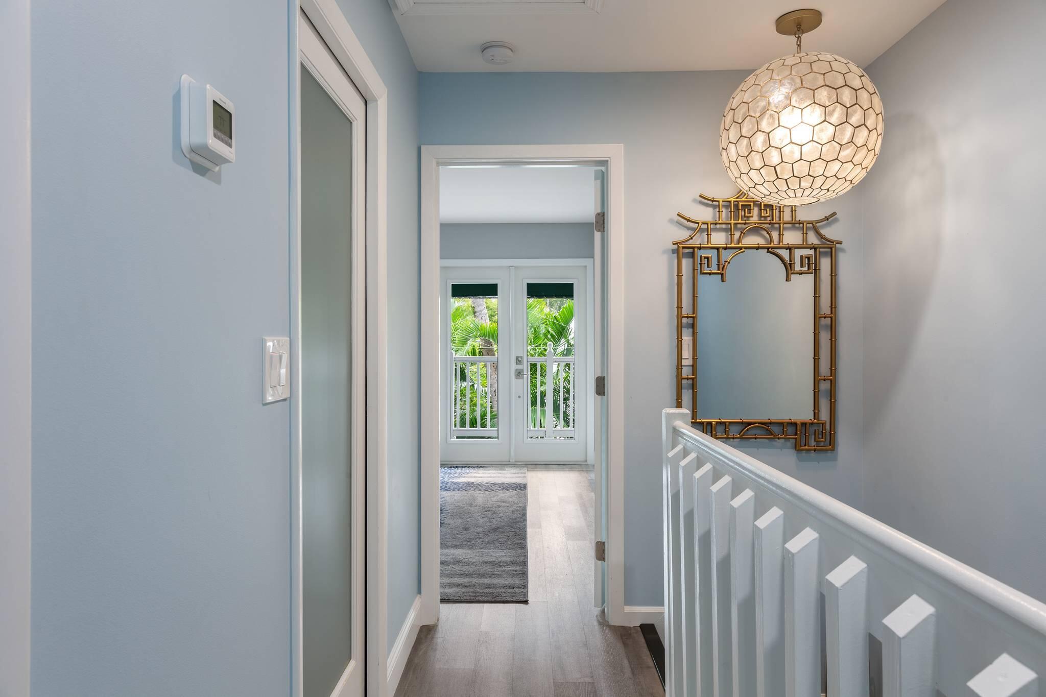 216 Fleming Street Key West, FL 33040 - Photo 22 of 33 a view of entryway with wooden floor