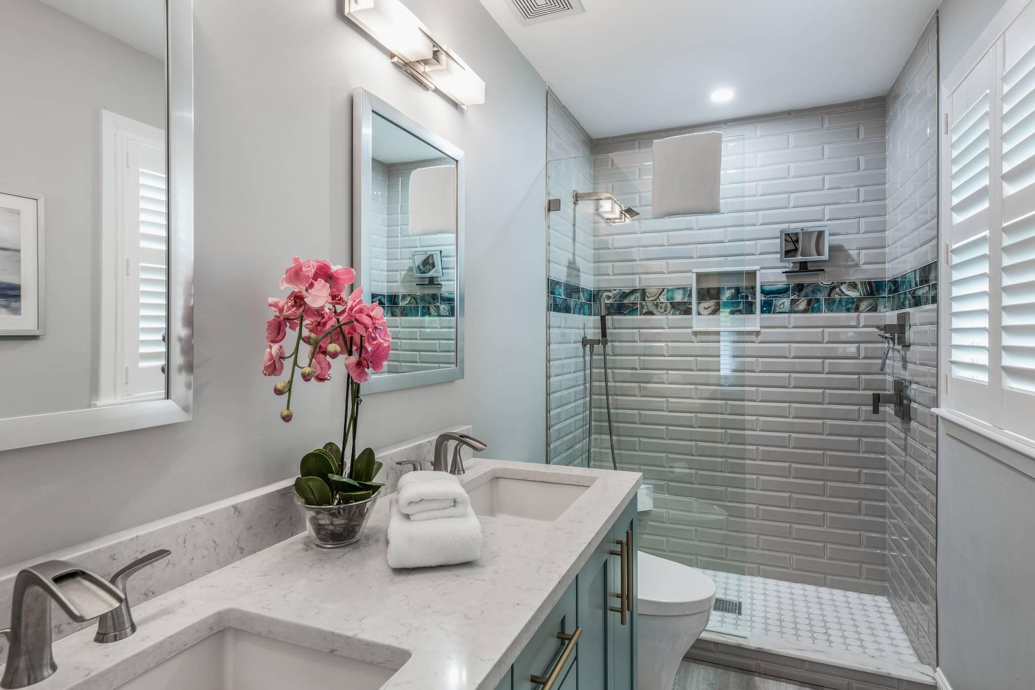 216 Fleming Street Key West, FL 33040 - Photo 27 of 33 a bathroom with a sink a vanity and a mirror