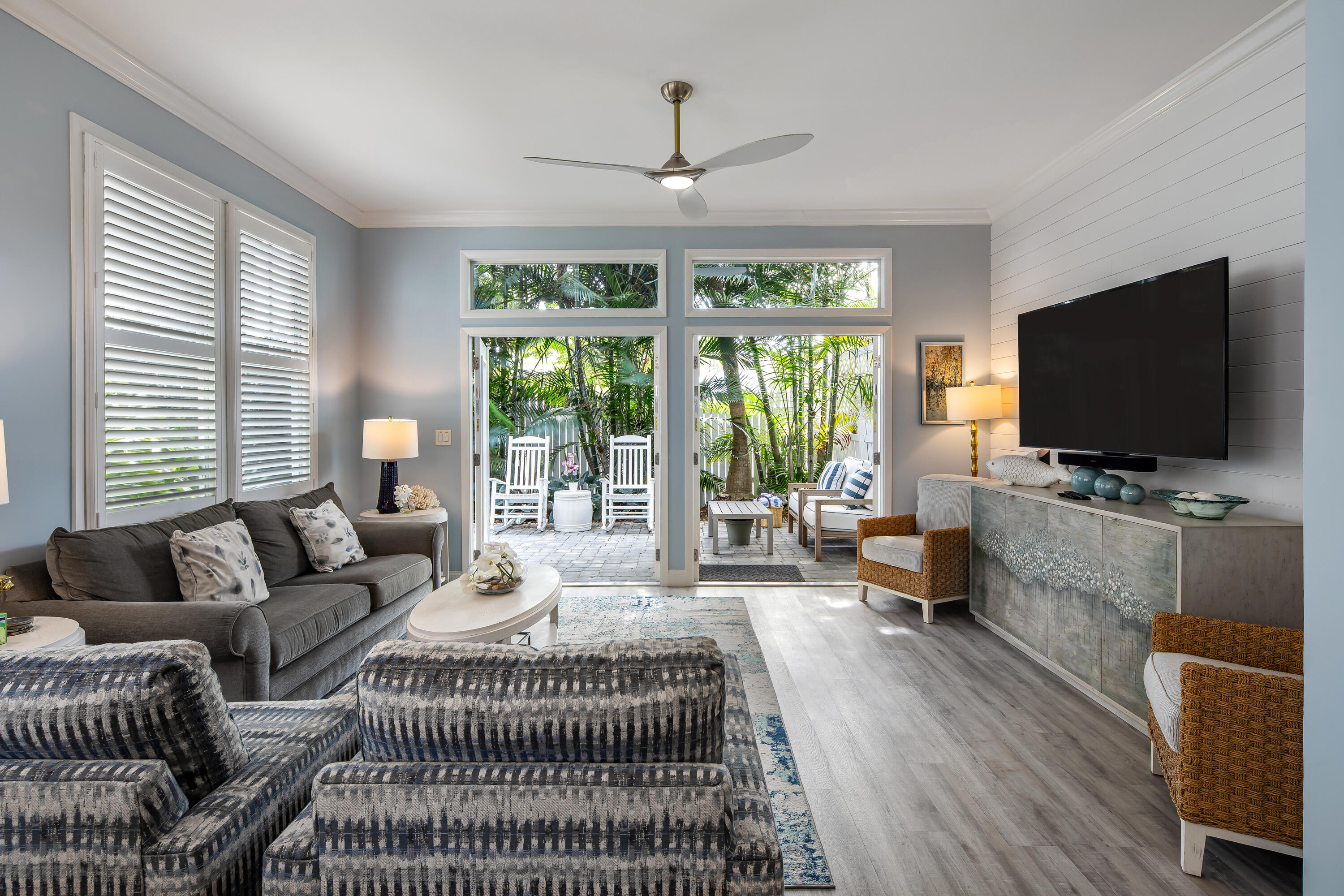 216 Fleming Street Key West, FL 33040 - Photo 3 of 33 a living room with furniture and a flat screen tv