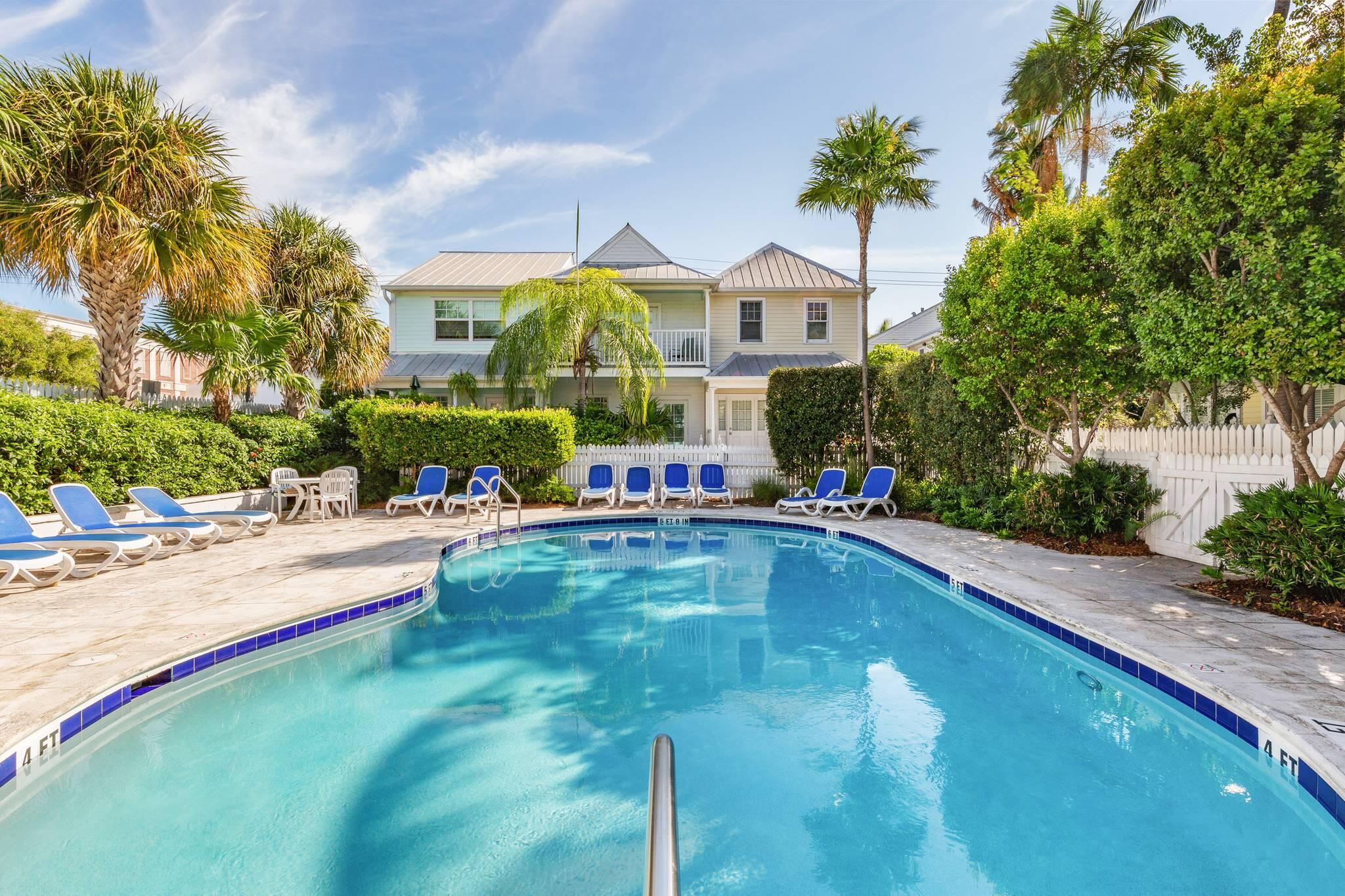 216 Fleming Street Key West, FL 33040 - Photo 32 of 33 a swimming pool view with a outdoor seating