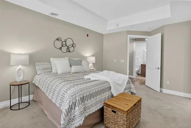 a bedroom with bed and window