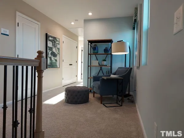 a workspace with furniture and a window