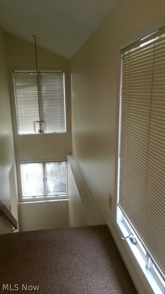 3892 South Turkeyfoot Road Akron, OH 44319 - Photo 8 of 15 Beautiful open stairway to master bedroom, bath and walkout patio. Offers great views!