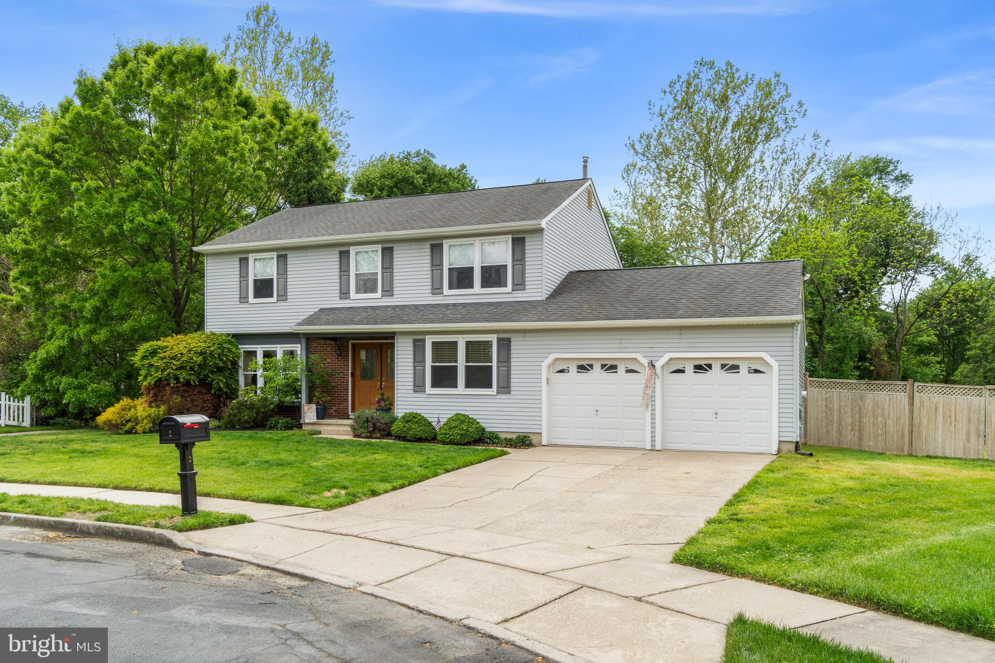 2 Farnham Court Laurel Springs, NJ 08021 - Photo 1 of 33 a front view of a house with garden