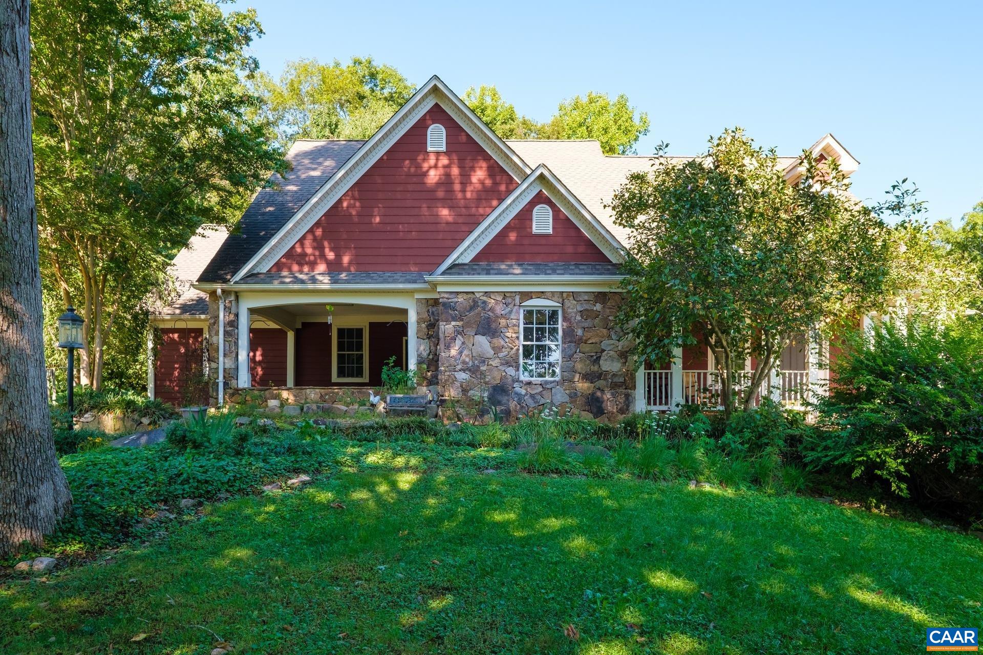 684 Campbell Road Keswick, VA 22947 - Photo 2 of 51 a front view of a house with a yard
