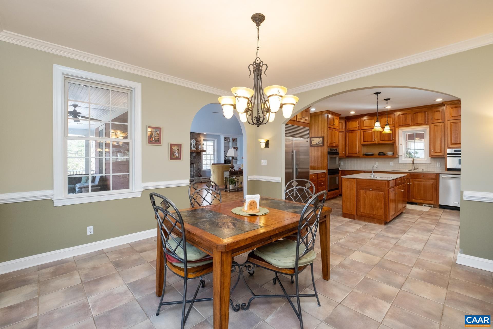684 Campbell Road Keswick, VA 22947 - Photo 26 of 51 a dining room with furniture and window