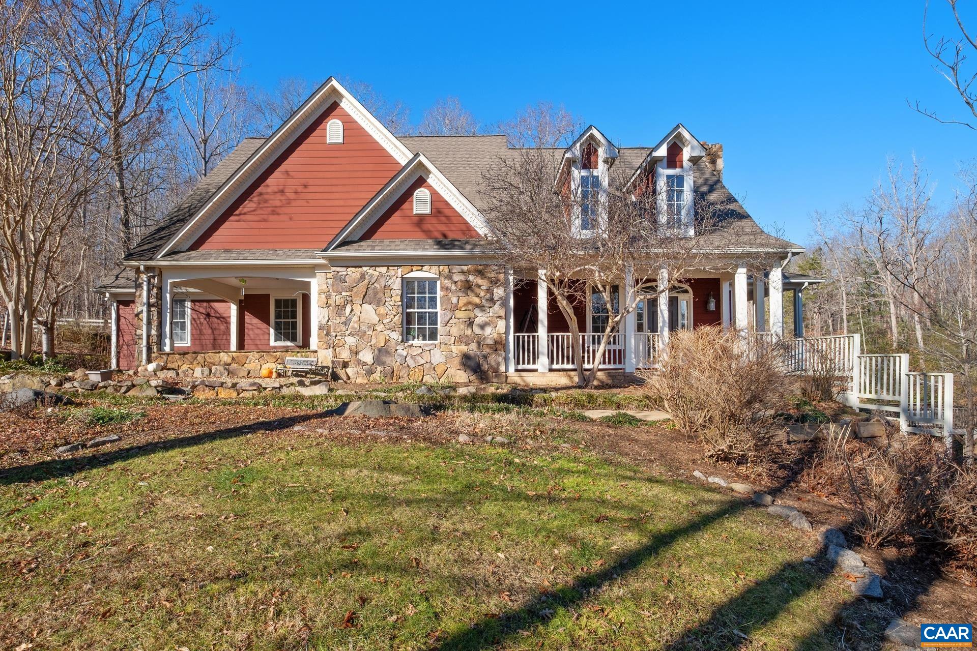 684 Campbell Road Keswick, VA 22947 - Photo 3 of 51 a front view of a house with garden