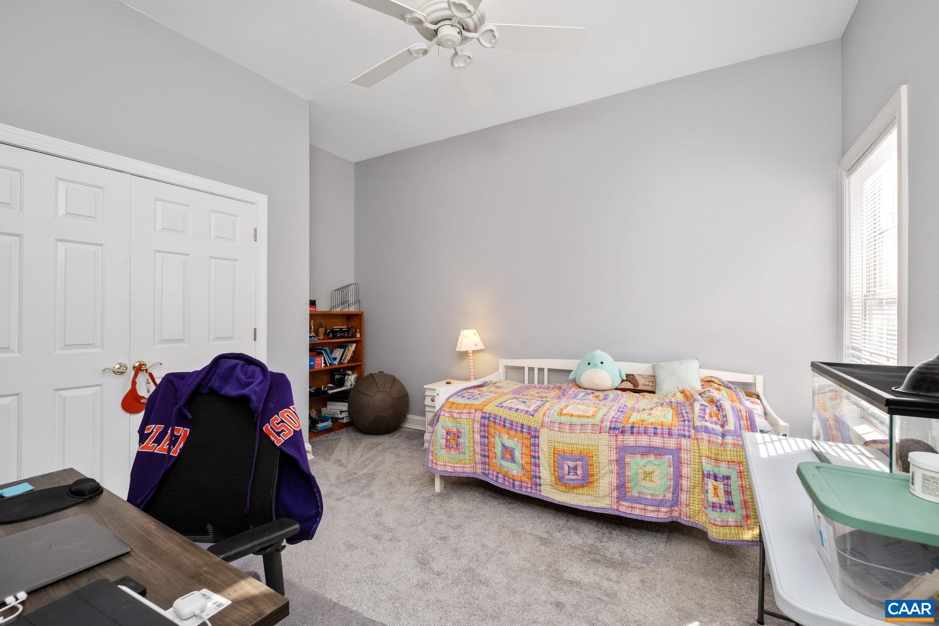 684 Campbell Road Keswick, VA 22947 - Photo 33 of 51 a bedroom with a bed and a window