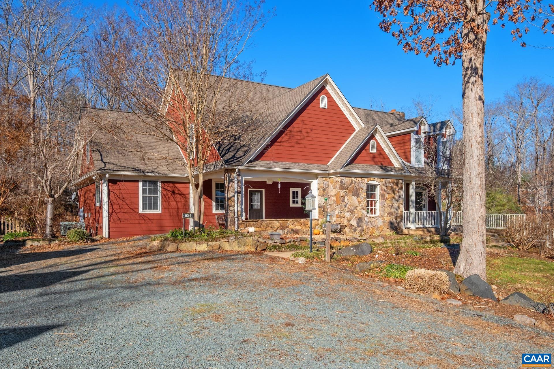 684 Campbell Road Keswick, VA 22947 - Photo 4 of 51 a front view of a house with a yard