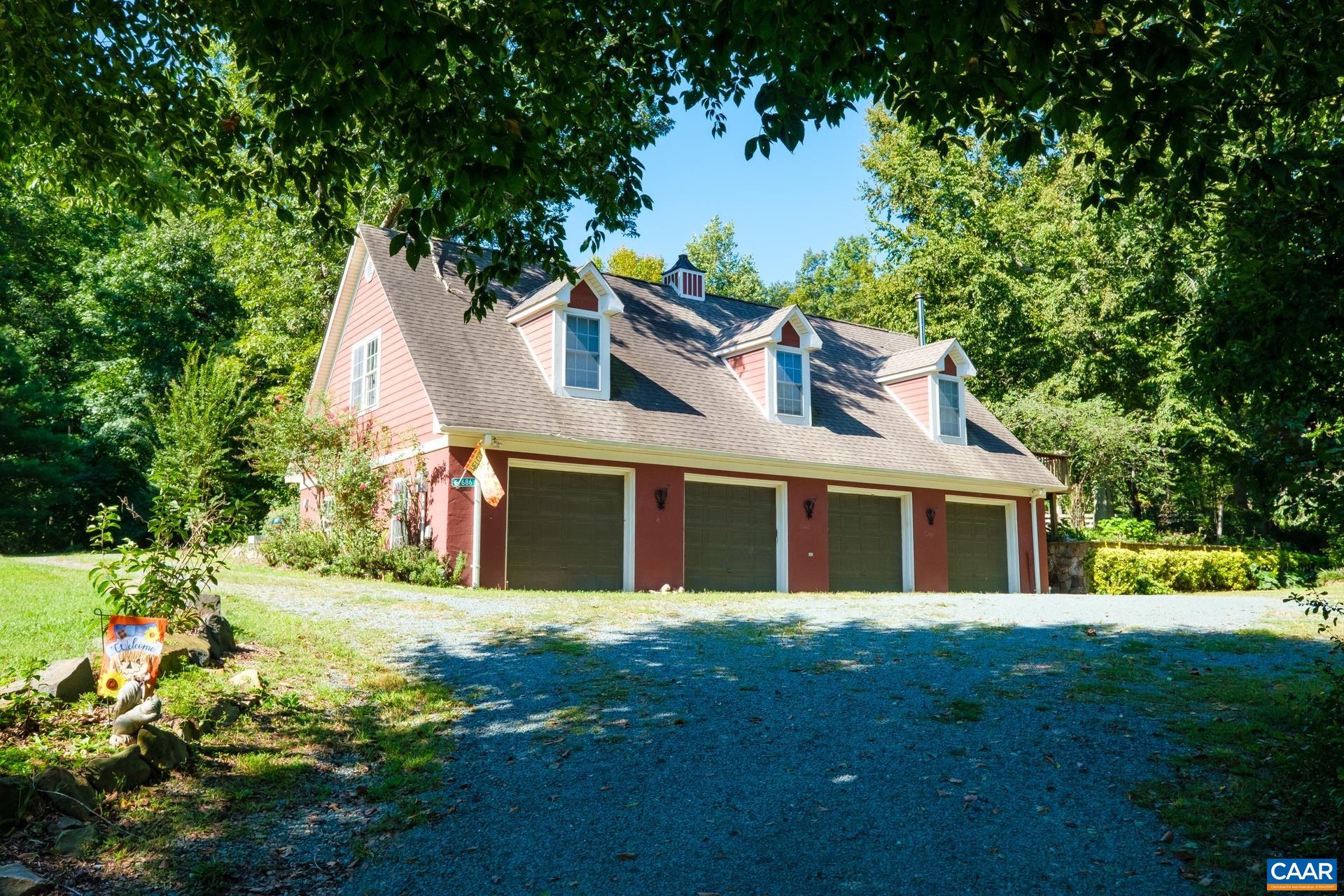 684 Campbell Road Keswick, VA 22947 - Photo 9 of 51 a front view of house with yard and green space