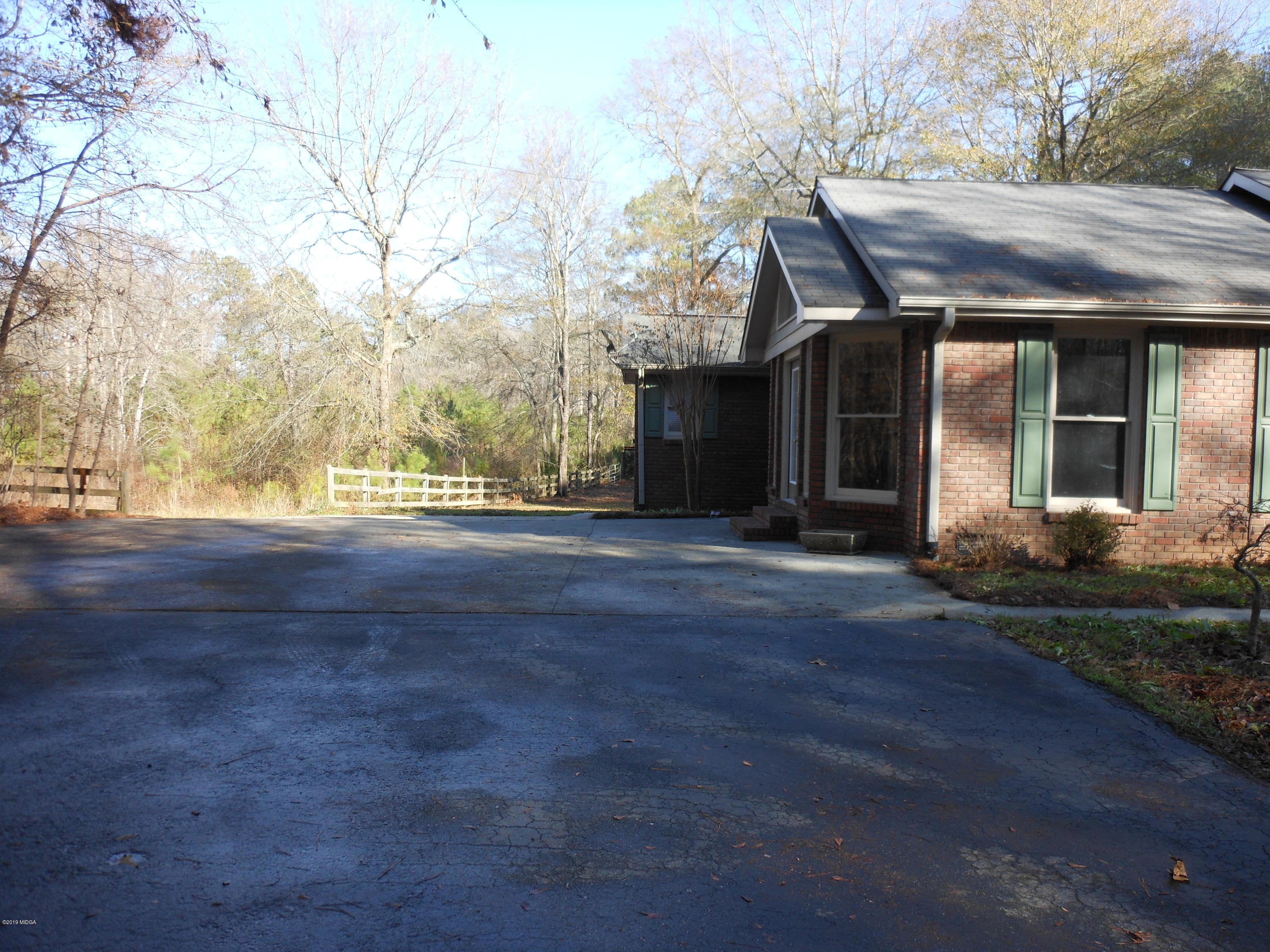 1248 Halls Bridge Road Jackson, GA 30233 - Photo 4 of 25 a view of a house with a yard