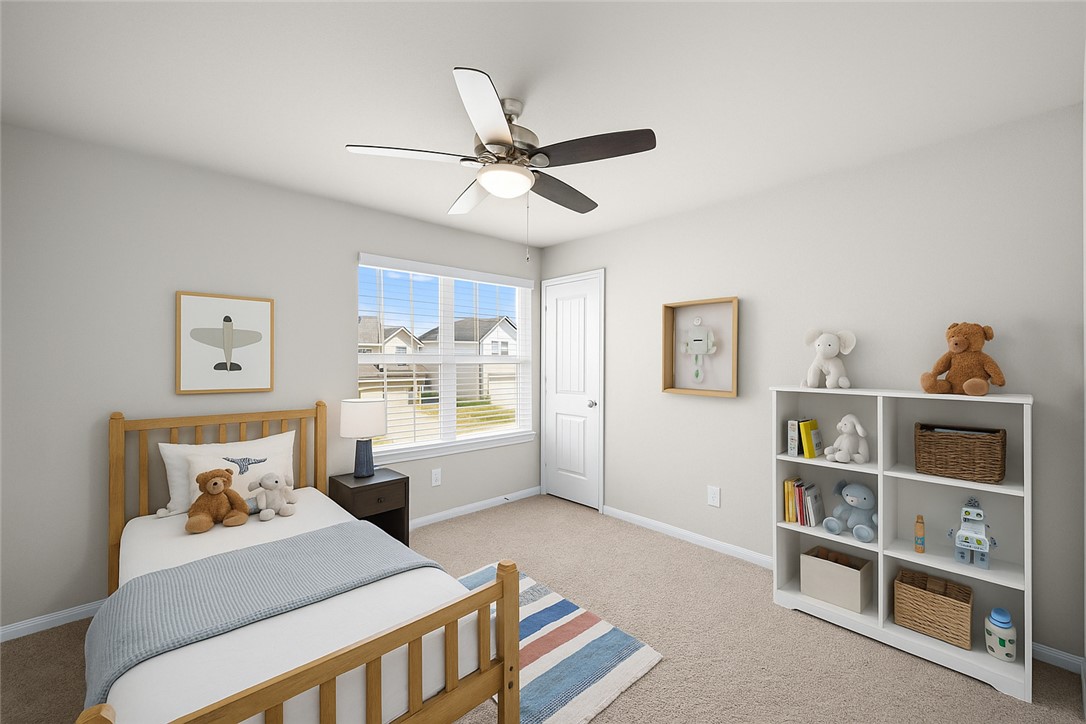 974 Harper Lane Bryan, TX 77803 - Photo 29 of 38 Bedroom with light carpet and ceiling fan