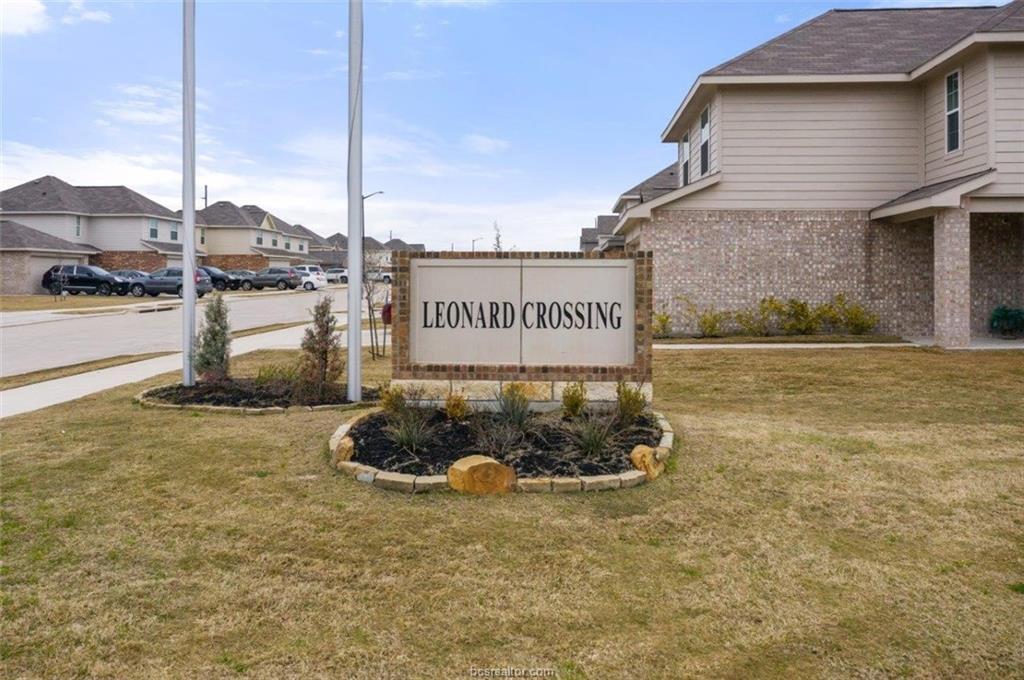 974 Harper Lane Bryan, TX 77803 - Photo 36 of 38 Community sign with a yard and a residential view