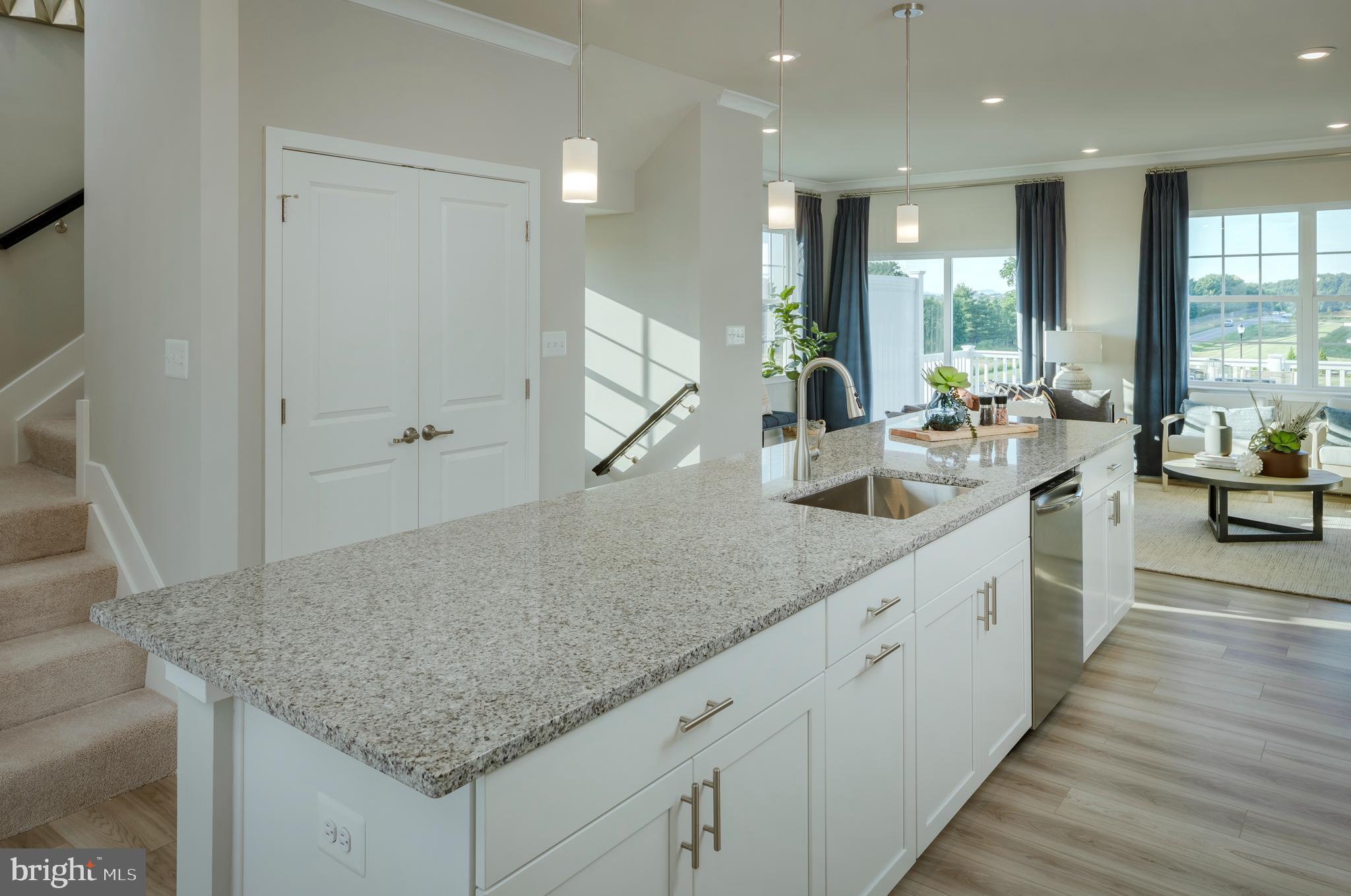 1845 Ritter Road Windsor Mill, MD 21244 - Photo 4 of 14 a large kitchen with kitchen island a sink appliances and a counter space