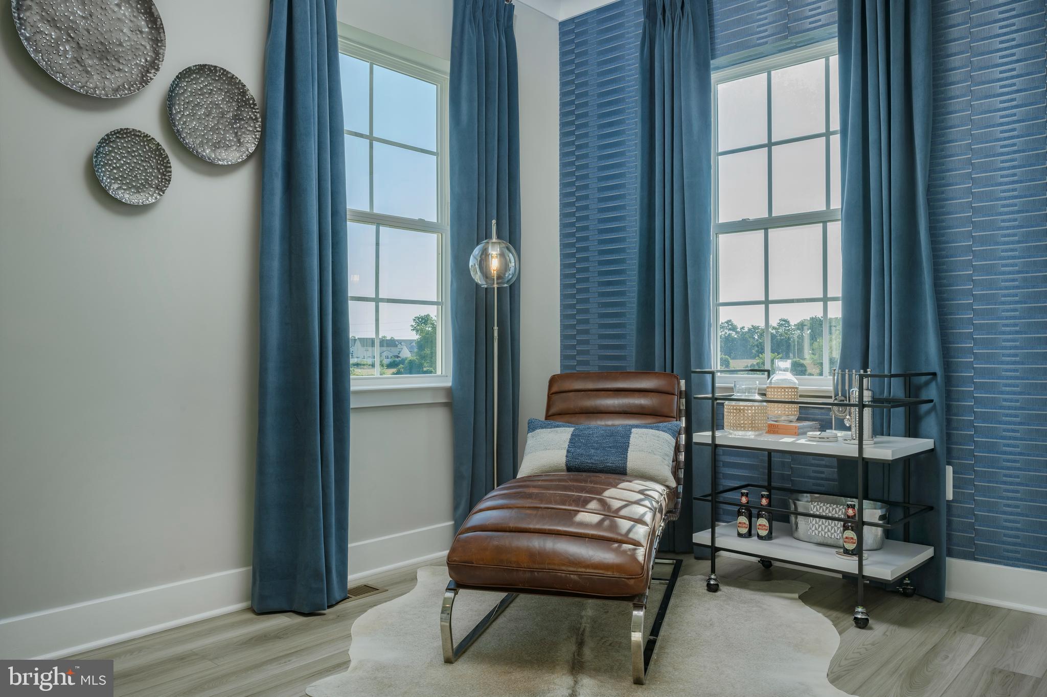 1845 Ritter Road Windsor Mill, MD 21244 - Photo 9 of 14 a living room with furniture and a window