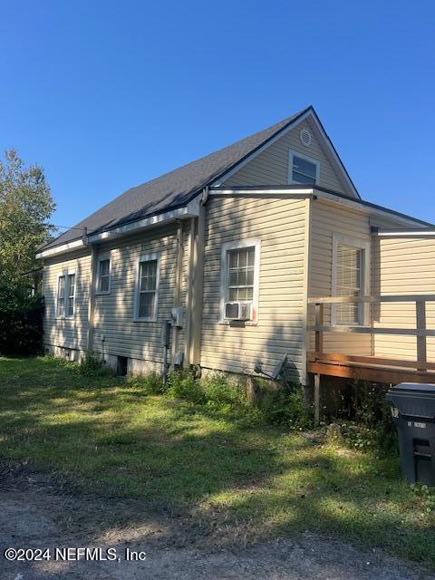54178 Fouracre Circle Callahan, FL 32011 - Photo 11 of 12 a front view of a house with a yard