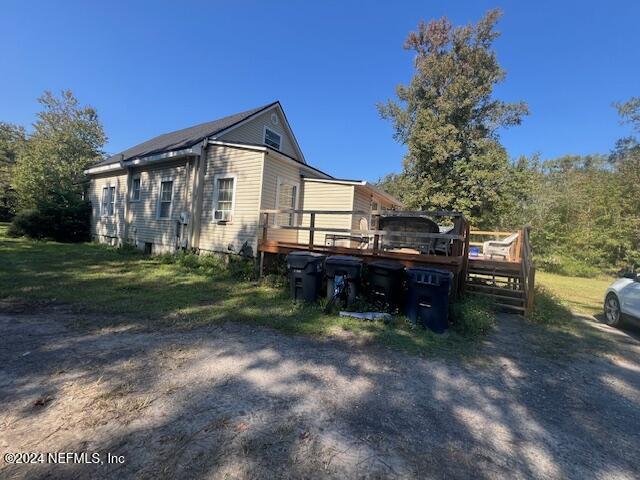 54178 Fouracre Circle Callahan, FL 32011 - Photo 12 of 12 a view of a house with backyard and sitting area