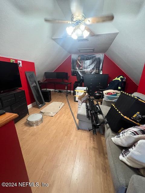 54178 Fouracre Circle Callahan, FL 32011 - Photo 9 of 12 a bed room with a bed furniture and a chandelier